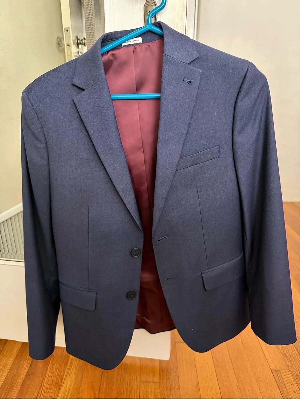 Blue Suit - dark navy. Colors look different from lighting but it is same color.